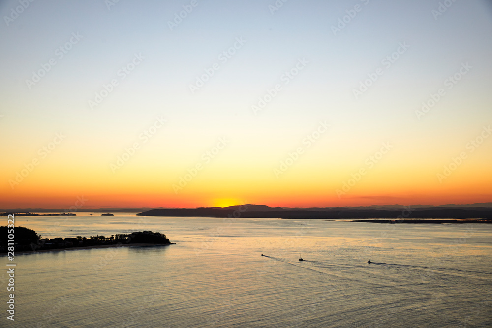 Boats in Port Stephens at sunset Boats in Port Stephens at sunset