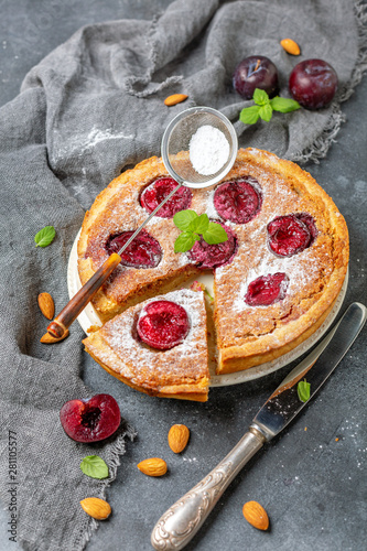 Homemade plum cake with almond frangipane. photo