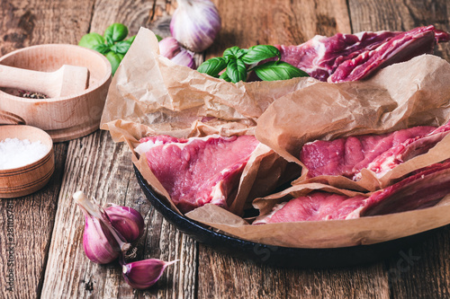 Raw veal steaks, preparing food photo