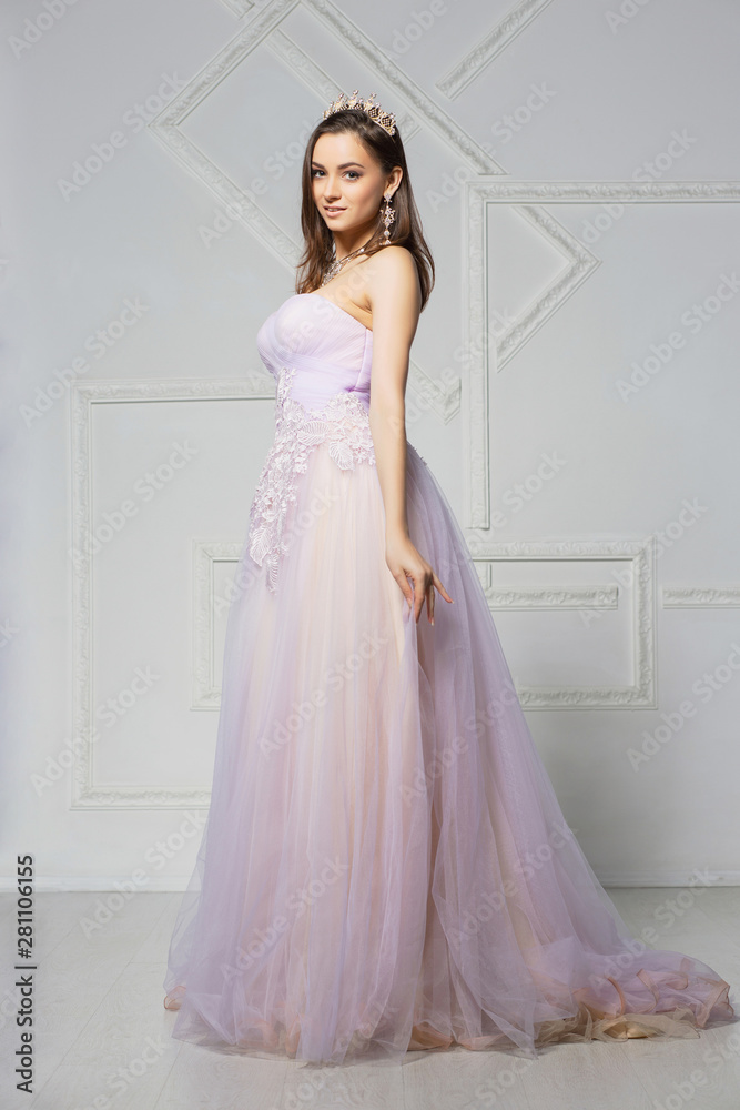 Fototapeta premium Lovely young woman posing in the studio.