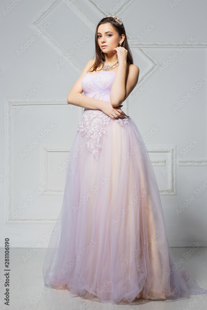 Beautiful young lady posing in the studio.