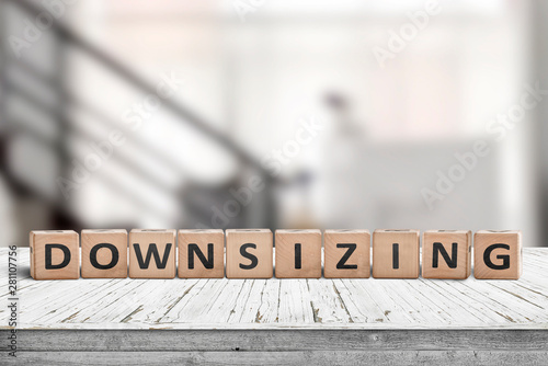 Downsizing message sign made of wood photo