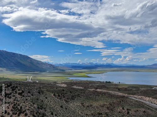 Aerial view of Lake Crowley over the mountain during blue summer day. Mono County, California, USA