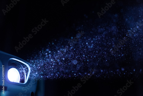 Bright projector light in darkness