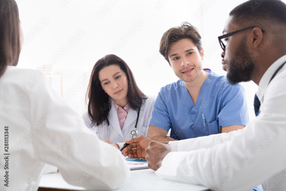 Fototapeta premium Doctors interacting at meeting in conference room