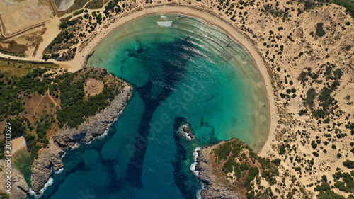 Aerial drone photo of Caribbean exotic paradise round shaped sandy bay with amazing turquoise and sapphire colours 