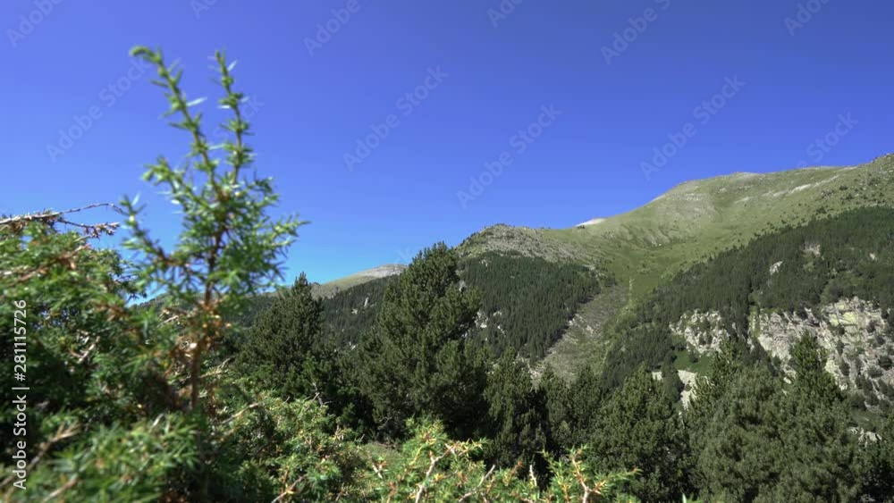 High mountains, Vall de Nuria on a sunny day. An example of high mountain valley in the in the Pyrenees. Very popular hiking route. High mountains, Vall de Nuria on a sunny day. An example of high mountain valley in the in the Pyrenees. Very popular hiking route.