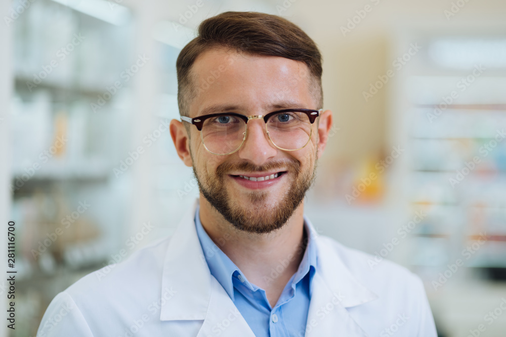 Close up of kind chemist that demonstrating his smile Close up of kind chemist that demonstrating his smile