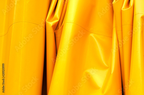 Tableau sur toile Yellow wrinkled tarpaulin background