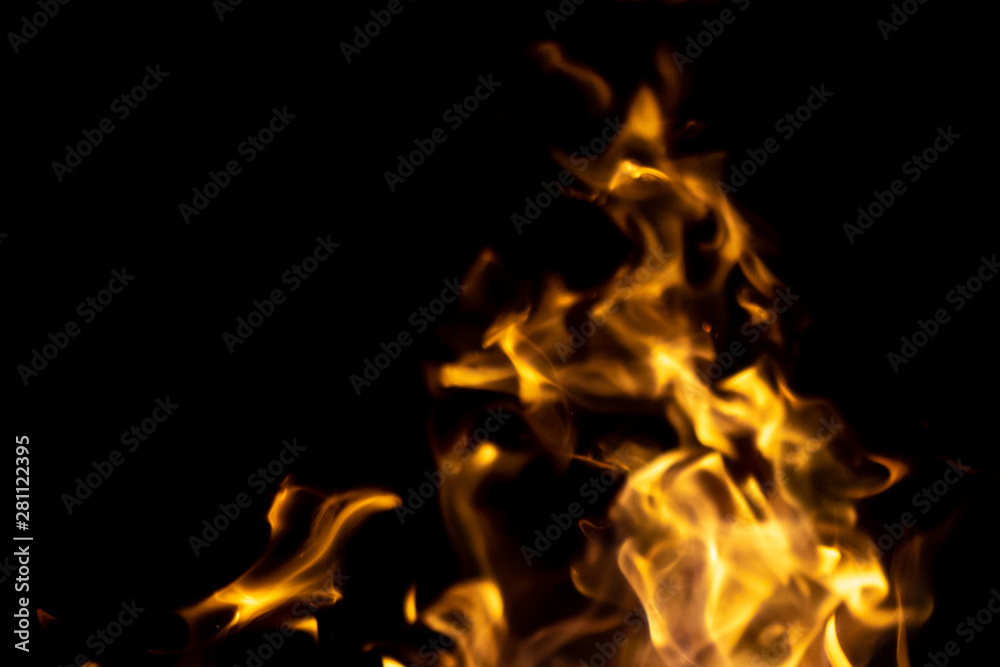 Fototapeta premium strong fire flames on black isolated background