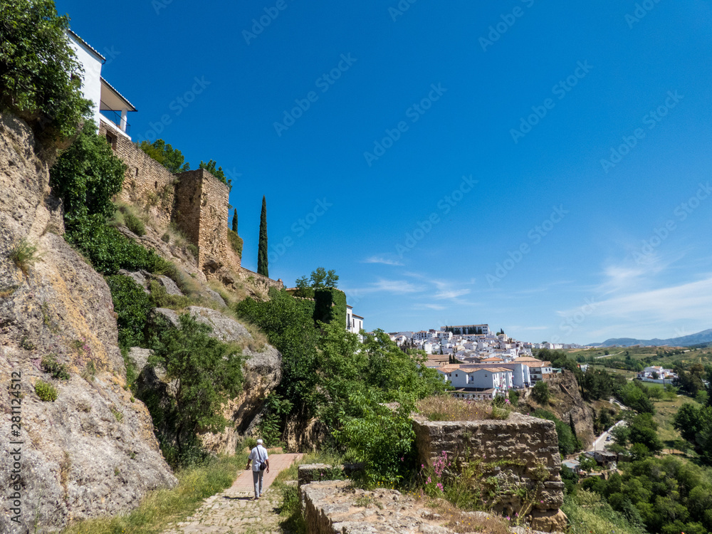 Beautifull surroundings of Ronda in sunny spring day, one person.