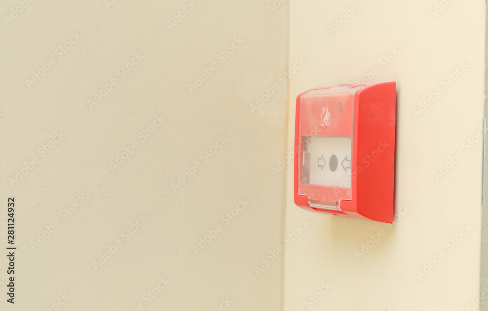 Fire alarm button on white wall.Fire safety for offices and shopping centers. Fire alarm button on white wall.Fire safety for offices and shopping centers.