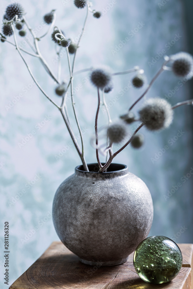 Close up of boho style vase with flowers - obrazy, fototapety, plakaty 