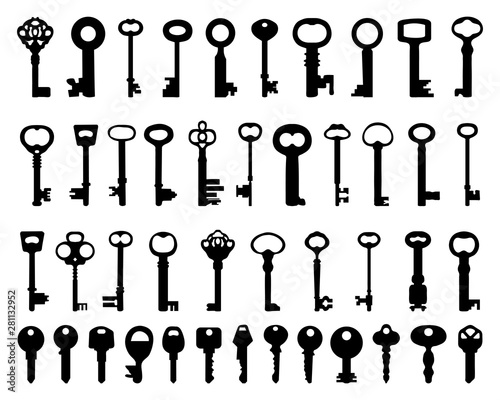 Set of black silhouettes of door  keys on a white background