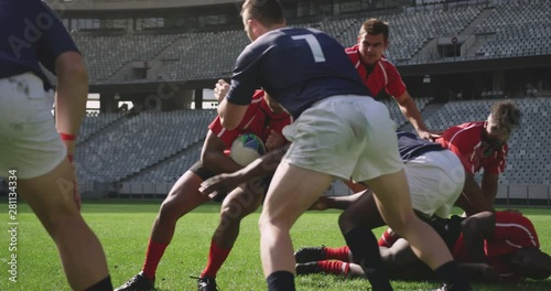 Rugby players playing rugby match in stadium 4k