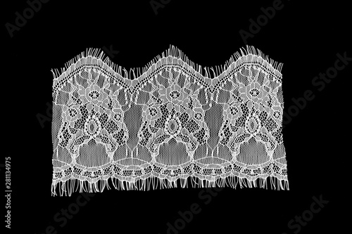 strip of black background white lace isolated,border lace