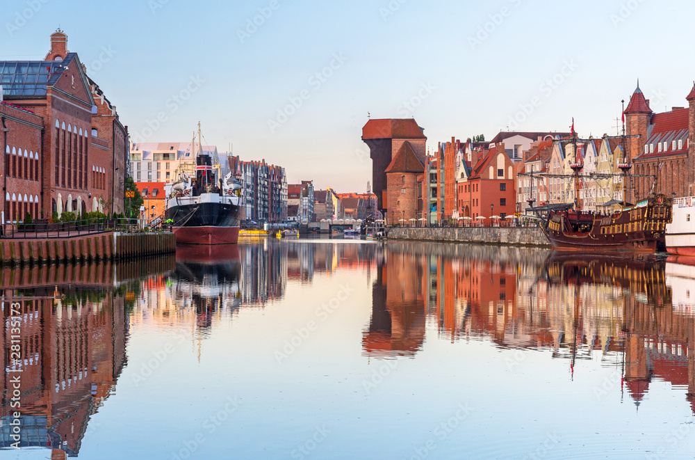 Gdansk with beautiful old town over Motlawa river at sunrise, Poland. Gdansk with beautiful old town over Motlawa river at sunrise, Poland.