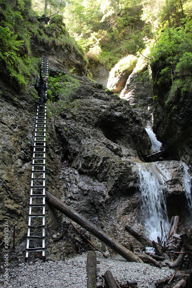 A tourist in the beautiful gorges of the Slovak Paradise National Park