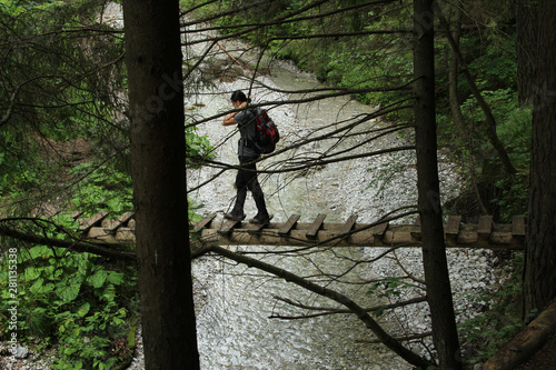 A tourist in the beautiful gorges of the Slovak Paradise National Park