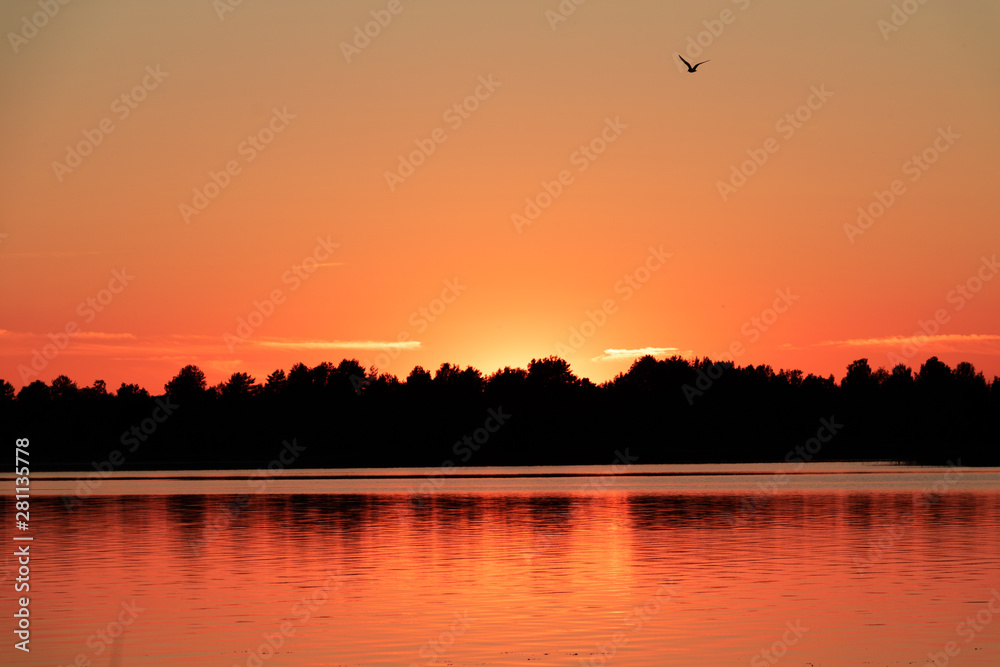 Naklejka premium sunset over lake Seliger
