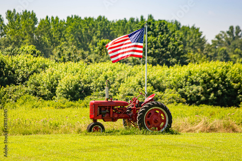 Symbols of American farming: tractor and flag