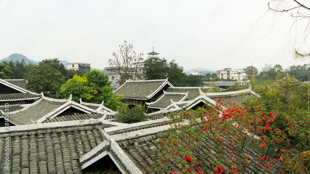 Traditional roofs of buildings in China. Ancient city Yangshuo, China