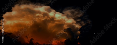 Big dramatic storm cloud (probably cumulonimbus) at summer twylight beside small moon (on the right side) photo