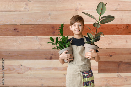 Cute little gardener on woo...