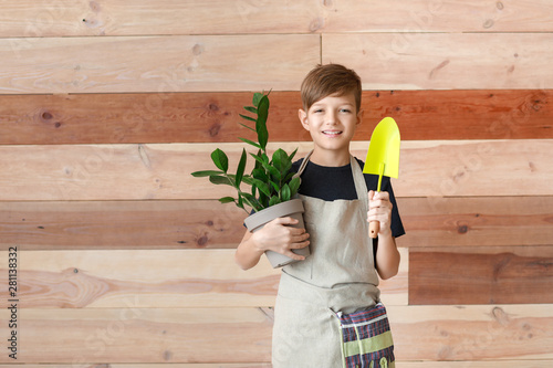 Cute little gardener on woo...