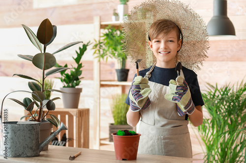 Cute little gardener with p...