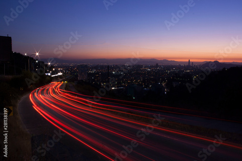 night; lights; traffic; movement; landscape; sunset; motion; background; blur; car; city; dark; fast; highway; light; motion; night; red; road; speed; street traffic; transport; transportation; travel