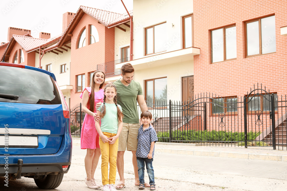 Obraz premium Happy family near car outdoors