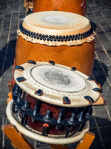 Traditional asian percussion instruments. Taiko or wadaiko or chu-daiko drum and shime-daiko or namitsuke ready for outdoor permormance photo