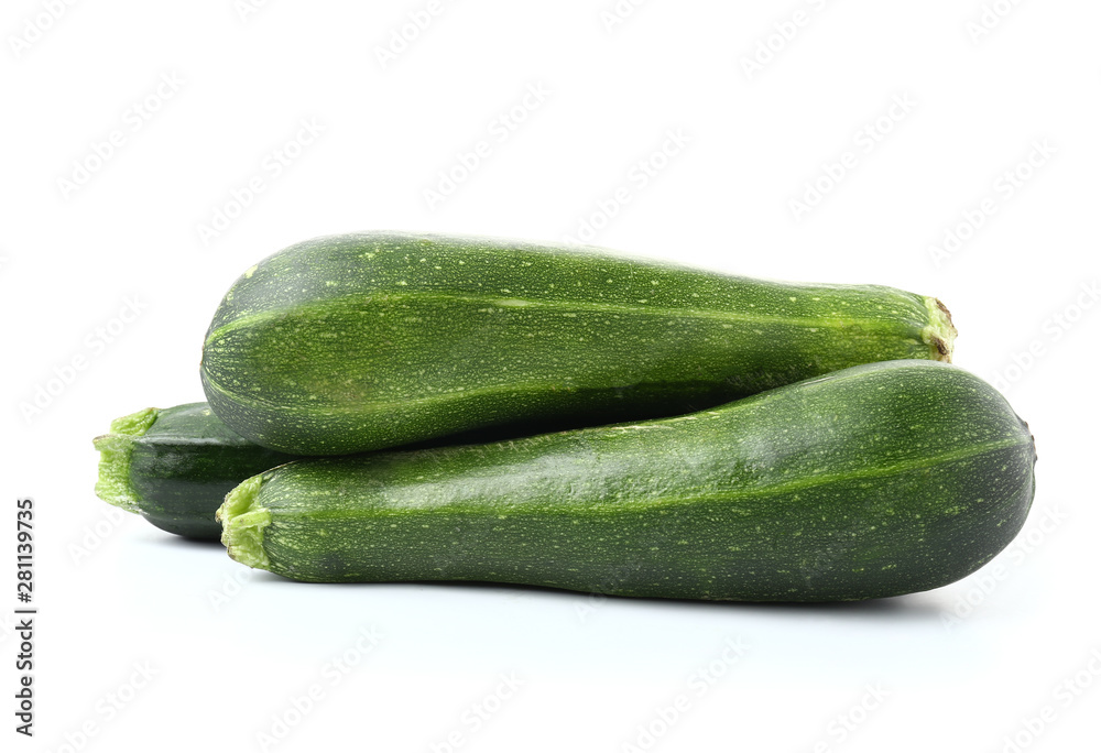 Fresh zucchini squashes on white background Fresh zucchini squashes on white background