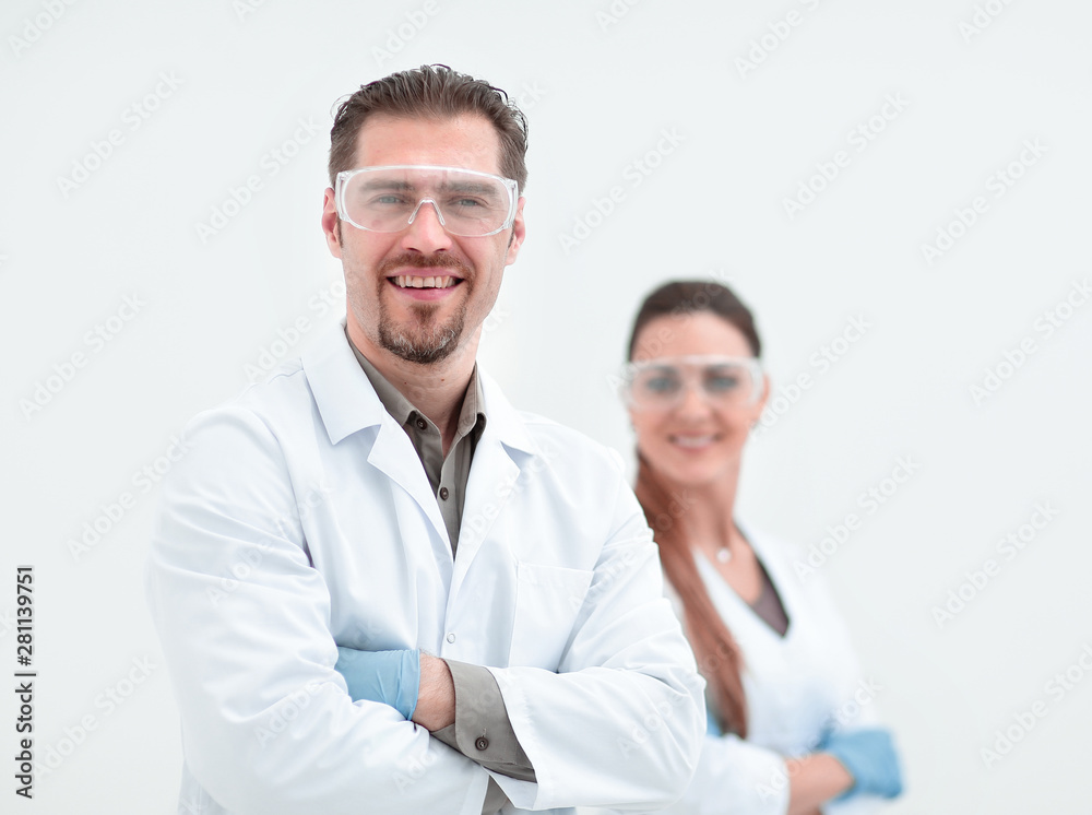 portrait of two successful researchers standing together portrait of two successful researchers standing together