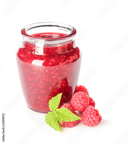 Jar of tasty raspberry jam on white background
