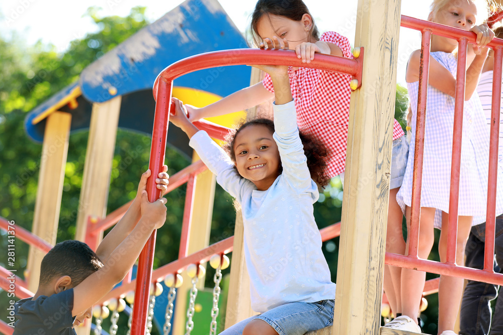 Fototapeta premium Cute little children on playground outdoors