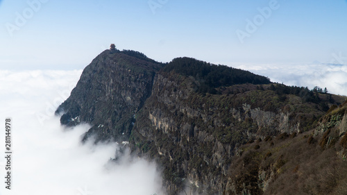 The hightest peak (3077m a.s.l.) of sacred mountain Mount Emei, pagoda above clouds, China