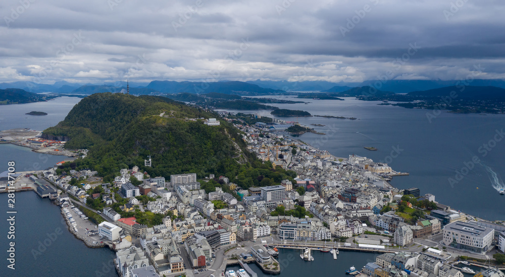 Aksla at the city of Alesund , Norway Aerial footage. It is a sea port, and is noted for its concentration of Art Nouveau architecture. Aerial drone shot. July 2019