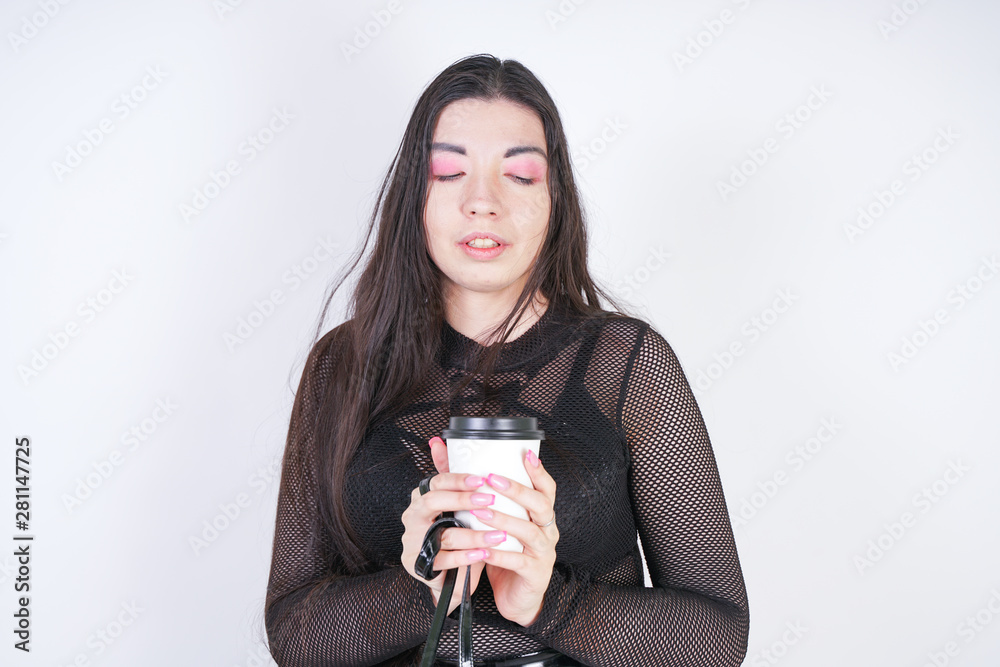 plus size asian woman in stylish dress with coffee plus size asian woman in stylish dress with coffee