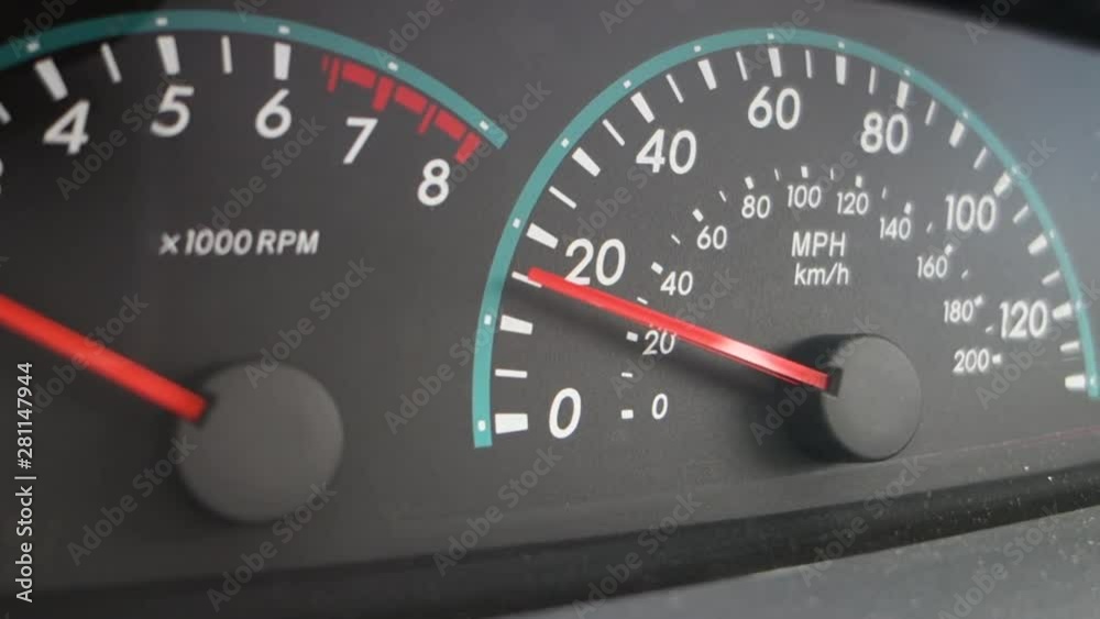 Close up shot of a speedometer shoing the acceleration of a vehicle. Close up shot of a speedometer shoing the acceleration of a vehicle.