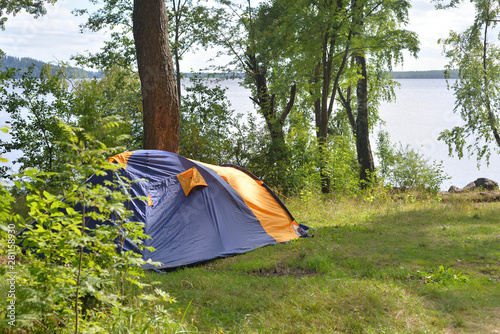 Camping tent in forest. photo