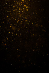Abstract gold bokeh with black