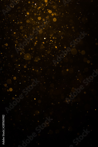 Abstract gold bokeh with black