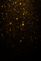 Abstract gold bokeh with black