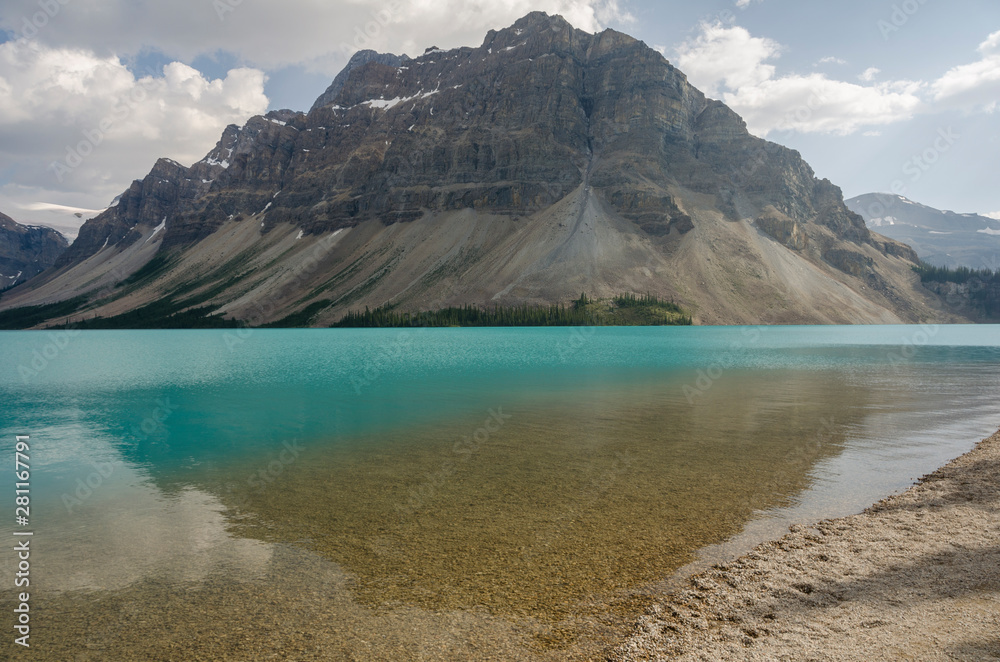 The end of Crowfoot Mountain towering over Bow Lake