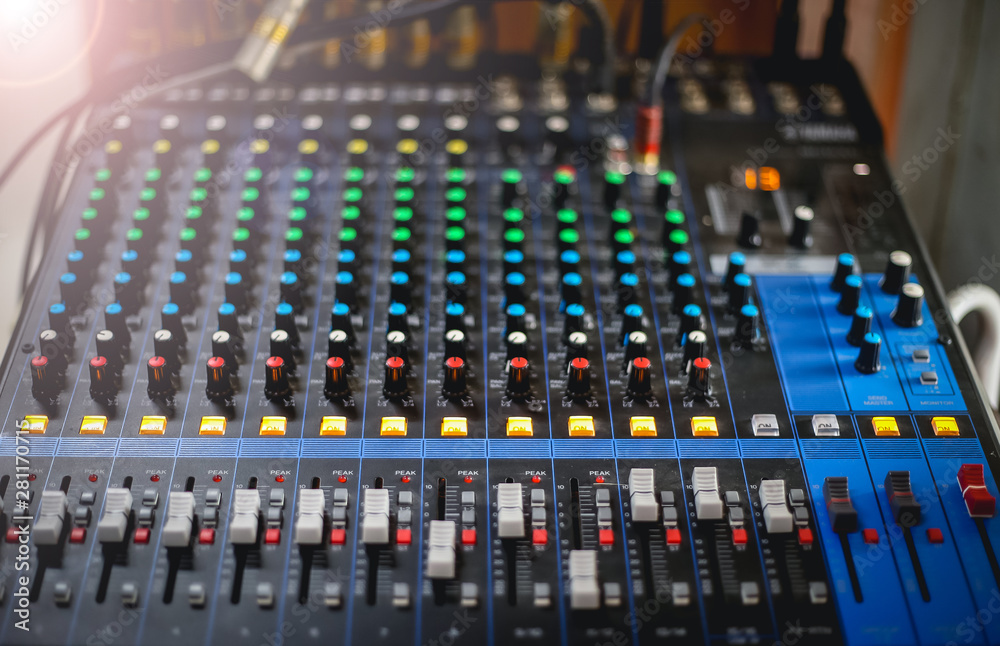 Professional mixing console in studio. Used for audio signals modifications to achieve the desired output. 