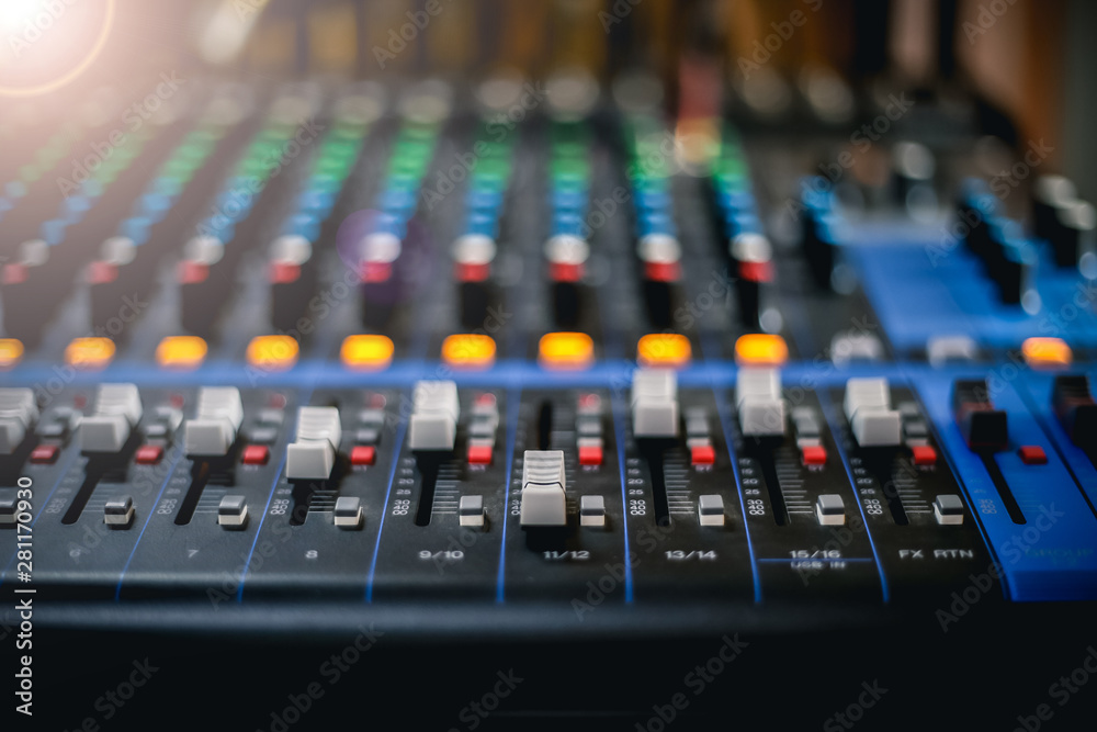 Professional mixing console in studio. Used for audio signals modifications to achieve the desired output. 