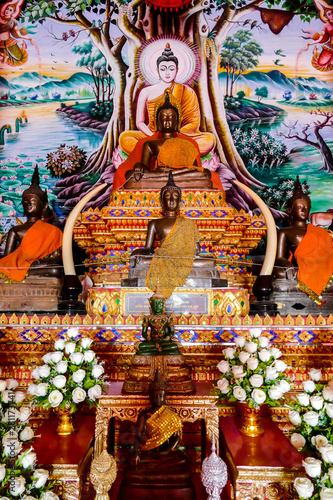 Sticker statue of buddha in temple, digital photo picture as a background