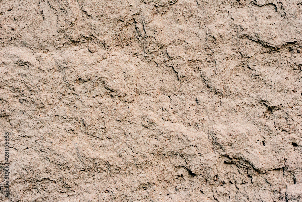 Texture of a concrete wall with cracks and scratches which can be used as a background Texture of a concrete wall with cracks and scratches which can be used as a background